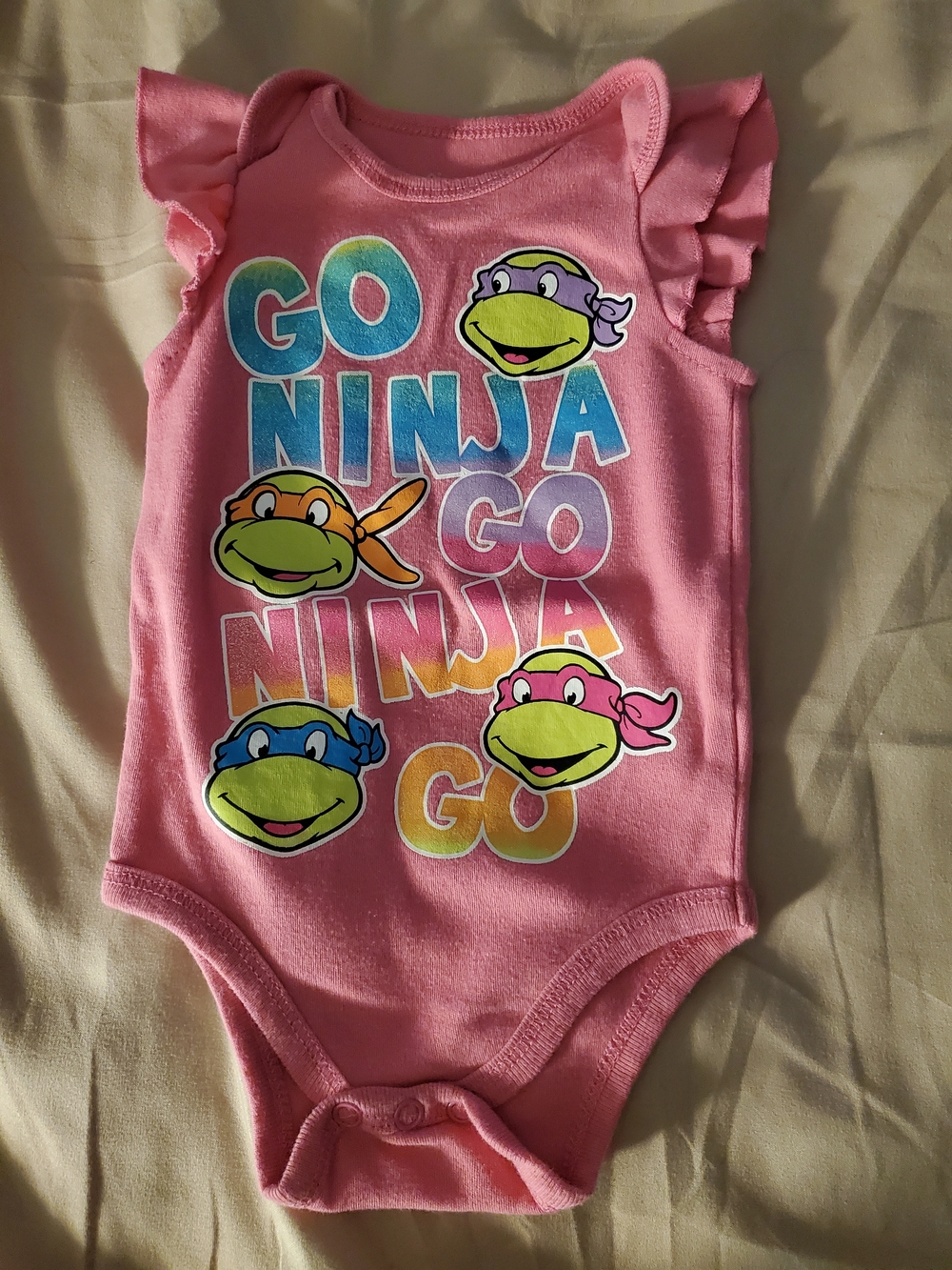 Pink Ninja Turtle Go Ninja Go Graphic Baby One-Piece